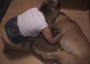 Curly amateur playing with dog's cock