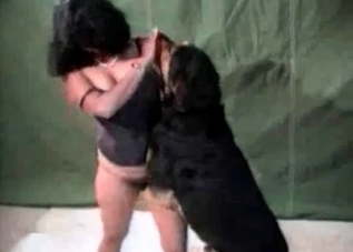 Thick chick takes dog's big dick