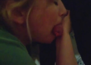 Blond-haired girl treats dog dick to a fellatio